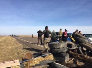 Dakota Access pipeline protesters confront law enforcement on Thursday, Oct. 27, 2016, near Cannon Ball, N.D. The months-long dispute over the four-state, $3.8 billion pipeline reached a crisis point when the protesters set up camp on land owned by pipeline developer Energy Transfer Partners. The disputed area is just to the north of a more permanent and larger encampment on federally-owned land where hundreds of protesters have camped for months.   (Caroline Grueskin/The Bismarck Tribune via AP)