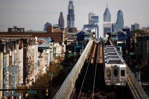 In this Wednesday, Oct. 26, 2016 photo, a train moves along the Market-Frankford Line in Philadelphia. Philadelphia’s transit strike ended Monday, Nov. 7, 2016 in its seventh day. The Southeastern Pennsylvania Transportation Authority said it has reached a tentative-five year deal with the union representing about 4,700 workers early Monday morning. (AP Photo/Matt Rourke)