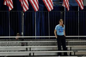 A Clinton supporter stands alone in the bleachers after Democratic presidential nominee Hillary Clinton's election night rally was canceled at the Jacob Javits Center in New York, Wednesday, Nov. 9, 2016. (AP Photo/Patrick Semansky)