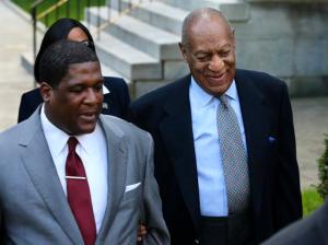 Bill Cosby, right, arrives for a hearing in his sexual assault case at the Montgomery County Courthouse on Tuesday, Nov. 1, 2016, in Norristown, Pa. Prosecutors at the pretrial hearing on Tuesday will ask the judge to let the other accusers testify to show Cosby drugged and molested young women in a "signature" fashion. (AP Photo/Mel Evans)