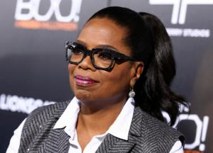 FILE - In this Oct. 17, 2016 file photo, Oprah Winfrey attends the world premiere of "BOO! A Madea Halloween" in Los Angeles. Winfrey said she was initially in disbelief after she learned Donald Trump was elected president of the United States. Winfrey doesn't think Trump's victory was a repudiation of Obama. She credits his victory to his millions of supporters who felt like their voices had not been heard. Winfrey says she is keeping an "open mind." (Photo by John Salangsang/Invision/AP, File)