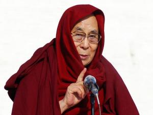 FILE - In this Saturday, Nov. 19, 2016, file photo, the Dalai Lama speaks at the Janraiseg temple of Gandantegchinlen monastery in Ulaanbaatar, Mongolia. Exiled Tibetan spiritual leader the Dalai Lama said Wednesday, Nov 23, 2016, he has "no worries" about Donald Trump's election as U.S. president and expects the businessman will align his policies with global realities. (AP Photo/ Ganbat Namjilsangarav, File)