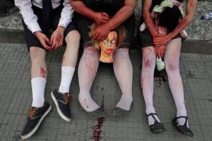 Participants in zombie costumes take part in the Zombie Walk in Sao Paulo, Brazil, Wednesday, Nov. 2, 2016. Participants commemorated the Day of the Dead with the annual Zombie Walk. (AP Photo/Andre Penner)