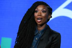FILE - In this Jan. 6, 2016, file photo, recording artist and actress Brandy Norwood speaks during the "Zoe Ever After" panel at the Viacom 2016 Winter TCA in Pasadena, Calif. Brandy performed a medley of some of her biggest hits after receiving the "Lady of Soul" award at the Soul Train Awards on Nov. 27, 2016. (Photo by Richard Shotwell/Invision/AP, File)