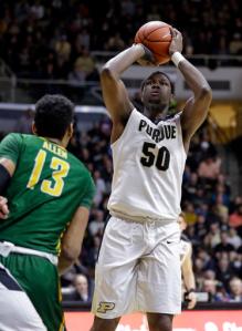 Purdue forward Caleb Swanigan (50) shoots over Norfolk State forward Stavian Allen (13) during the second half of an NCAA college basketball game in West Lafayette, Ind., Wednesday, Dec. 21, 2016. Purdue defeated Norfolk State 91-45. (AP Photo/Michael Conroy)