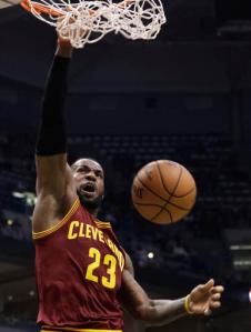 Cleveland Cavaliers' LeBron James dunks during the first half of an NBA basketball game against the Milwaukee Bucks Tuesday, Nov. 29, 2016, in Milwaukee. (AP Photo/Morry Gash)