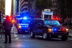 FILE - In this Nov. 18, 2016, file photo, a motorcade carrying President-elect Donald Trump leaves Trump Tower in New York. Trump knows how to make a moment. The president-elect is flying to Indiana on Dec. 1 for an event with officials from Carrier Corp., which is keeping about 1,000 jobs in the U.S. instead of moving them to Mexico. In doing so, he’s showing an early deftness for the way the theater of the presidency can be used to shape perceptions of those who occupy the Oval Office. (AP Photo/Andres Kudacki, File)