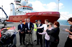 Australian Federal Infrastructure and Transport Minister Darren Chester, third left, holds a press conference, Monday, Jan. 23, 2017, in Perth, Australia, with Malaysian Transport Minister Liow Tiong Lai, left, and other officials in front of the search ship Fugro Equator, one of the vessels involved in the MH370 search. Transport officials from Australia, Malaysia and China met the crew of Fugro Equator, who were ordered to return last week after the countries officially suspended the nearly three-year search for the plane in the Indian Ocean. (Richard Wainwright/AAP Image via AP)
