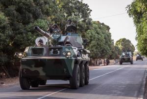 A convoy of Senegal soldiers en route towards the Gambia boarder with Senegal near Karang, Senegal, Thursday, Jan. 19, 2017. Senegalese troops charged into neighboring Gambia late Thursday to support the country's newly inaugurated president, while longtime ruler Yahya Jammeh showed no sign of stepping down. (AP Photo/Sylvain Cherkaoui)