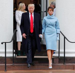 President-elect Donald Trump and his wife Melania walk out together after attending church service at St. John's Episcopal Church across from the White House in Washington, Friday, Jan. 20, 2017. (AP Photo/Pablo Martinez Monsivais)
