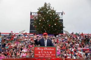 FILE - In this Saturday, Dec. 17, 2016, file photo, President-elect Donald Trump speaks during a rally at Ladd-Peebles Stadium in Mobile, Ala.  (AP Photo/Evan Vucci, File)