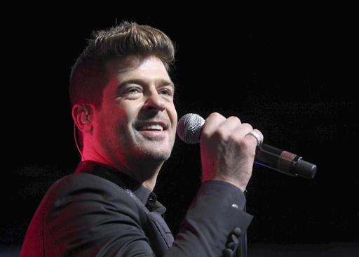 Judge restricts Robin Thicke’s contact with his son,&nbsp;ex-wife