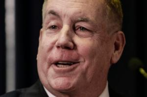 Neb. state Sen. Bill Kintner of Papillion announces at a news conference in Lincoln, Neb., Wednesday, Jan. 25, 2017, that he is resigning the seat he has held since 2012, following an uproar over a tweet he sent that implied Women's March protesters were too unattractive to be victims of sexual assault. He made the announcement less than an hour before Nebraska lawmakers were scheduled to debate whether to expel him. (AP Photo/Nati Harnik)