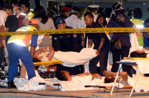 Survivors of a sank boat receive medical assistance at the Malaysia Marine Operation Force post in Kota Kinabalu, Sabah, Malaysia on Monday, Jan. 30, 2017. More than 20 people, mostly Chinese tourists, were rescued Sunday after their boat sank in strong wave. (AP Photo)