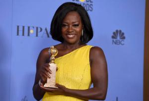 Viola Davis poses in the press room with the award for best performance by an actress in a supporting role in any motion picture for "Fences" at the 74th annual Golden Globe Awards at the Beverly Hilton Hotel on Sunday, Jan. 8, 2017, in Beverly Hills, Calif. (Photo by Jordan Strauss/Invision/AP)