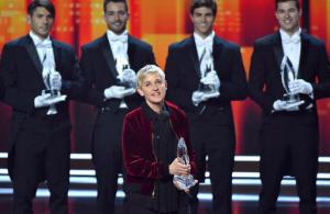 Ellen DeGeneres, winner of the awards for favorite animated movie voice, favorite daytime TV host, and favorite comedic collaboration, speaks on stage at the People's Choice Awards at the Microsoft Theater on Wednesday, Jan. 18, 2017, in Los Angeles. Pictured in the background are DeGeneres' previous People's Choice awards, making her the most decorated People's Choice Award winner in the show's history. (Photo by Vince Bucci/Invision/AP)