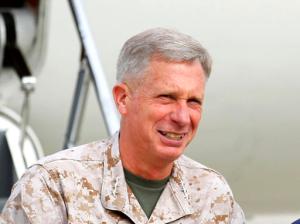 FILE - In this March 30, 2012 file-pool photo, Marine Gen. Thomas Waldhauser is seen at Camp Pendleton, Calif. Senior U.S. military officials say the massive airstrikes that killed more than 80 Islamic State militants in southern Libya last month generated critical computer data, documents and information from prisoner interrogations that the U.S. can use to track and target more fighters. Waldhauser, the head of U.S. Africa Command, told The Associated Press in an interview Friday, Feb. 17, 2017, that the U.S. got significant intelligence from the camps after the bombings, adding that "there's some things we're working on."  (AP Photo/Mike Blake, Pool, File)