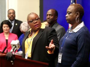 Roxanne Adams speaks about her mentally ill nephew Jamycheal Mitchell, who died in Hampton Roads Regional Jail, during a press conference in the General Assembly Building in Richmond, Va., with her sister and mother of Jamycheal, Sonia Adams by her side Wednesday, Jan. 18, 2017. Virginia legislators spoke about bills to prevent deaths like Jamycheal's from happening in Virginia jails. (Alexa Welch Edlund/Richmond Times-Dispatch via AP)