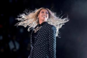 FILE - This Nov. 4, 2016 file photo shows Beyonce performing at a Get Out the Vote concert for Democratic presidential candidate Hillary Clinton in Cleveland. Beyonce announced on her Instagram account, Wednesday, Feb. 1, 2017, that she is expecting twins.  (AP Photo/Andrew Harnik, File)