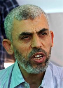 FILE - In this Thursday, Oct. 20, 2011, freed Palestinian prisoner Yehiya Sinwar, a founder of Hamas' military wing, talks during an interview to the Associated Press in Khan Younis, southern Gaza Strip, Thursday, Oct. 20, 2011. A senior Hamas official says the top member of the group's armed wing has been chosen as its new leader in the Gaza Strip. Yehiya Sinwar, the senior commander who was freed by Israel in a 2011 prisoner swap, is considered one of the most hard-line figures in the Islamic militant group. (AP Photo/Adel Hana, File)