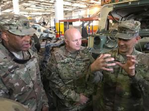 U.S. Army Lt. Gen. Stephen Townsend, right, talks with officers during a tour north of Baghdad, Iraq, Wednesday, Feb. 8, 2017. Forces fighting the Islamic State group should be able to retake the IS-held cities of Mosul in Iraq and Raqqa in Syria within the next six months, according to the top U.S. commander in Iraq. On a tour north of Baghdad Wednesday, Townsend said “within the next six months I think we’ll see both (the Mosul and Raqqa campaigns) conclude.” (AP Photo/ Ali Abdul Hassan)