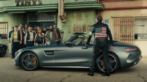 This photo provided by Mercedes-Benz USA shows an image from the company's "Easy Driver" Super Bowl 51 commercial. To target baby boomers, Mercedes-Benz enlisted the Coen Bros. to direct an update to the tune of Steppenwolf’s “Born to be Wild.” Bikers at a bar are furious that their bikes have been blocked by a car, until they realize its Peter Fonda driving a Mercedes-Benz AMG Roadster. (Mercedes-Benz USA via AP)