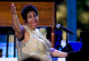 FILE - In this April 29, 2016 file photo, Aretha Franklin performs at the International Jazz Day Concert on the South Lawn of the White House of the Washington. Franklin is planning to retire this year. The singer says she has one more album planned, with several tracks produced by Stevie Wonder, and will otherwise limit herself to “some select things” as she devotes more time to her grandchildren. (AP Photo/Carolyn Kaster, File)