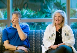 In a Feb. 23, 2017 photo, Dr. Colleen Coleman, right, laughs with at Dr. Brian Dunn as they reunite at Hoag Hospital in Newport Beach, Calif., for the first time since she donated her kidney to him. The two have been friendly more than a decade while working together. Coleman is a surgeon and Dunn is an anesthesiologist at Hoag Hospital Newport Beach. (Cindy Yamanaka/The Orange County Register via AP)