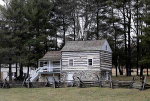 In this Feb. 8, 2017 photo, the farmhouse where abolitionist John Brown launched his ill-fated, 1859 seizure of a Harpers Ferry, W.Va., federal armory stands in Dargan, Md.  A new book traces a connection between 19th-century abolitionist John Brown and soul singer James Brown. The common ground is the farmstead near Dargan, Maryland, where John Brown launched his 1859 raid on a federal armory in nearby Harpers Ferry, W.Va. (AP Photo/Patrick Semansky)