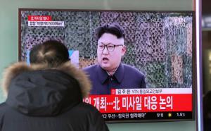 A man watches a TV news program showing a file footage of North Korean leader Kim Jong Un with letters reading: "The North fired a missile" at the Seoul Train Station in Seoul, South Korea, Sunday, Feb. 12, 2017. North Korea reportedly fired a ballistic missile early Sunday in what would be its first such test of the year and an implicit challenge to President Donald Trump's new administration. Details of the launch, including the type of missile, were scant. (AP Photo/Lee Jin-man)