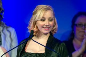 FILE – In this May 6, 2014, file photo, Amanda Berry, on the anniversary of her escape from a Cleveland home where she and two others were held captive for a decade, is honored at the National Center for Missing and Exploited Children's annual Hope Awards dinner in Washington. Cleveland television station WJW-TV announced Sunday, Feb. 5, 2017, that Berry will host daily segments publicizing other missing-persons cases. (AP Photo/Cliff Owen, File)