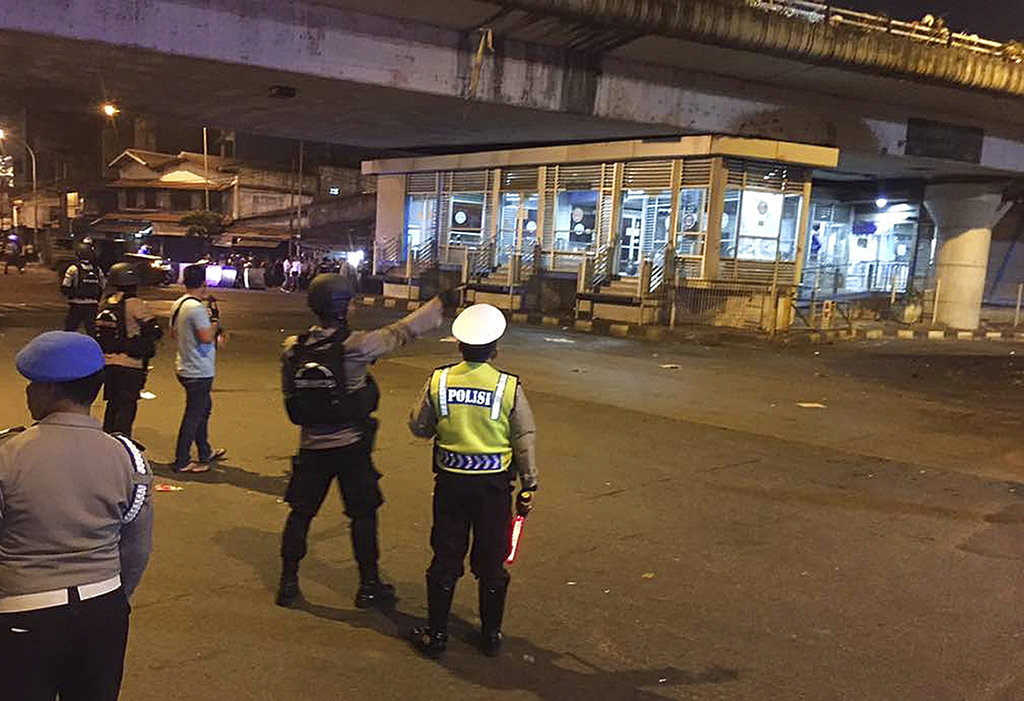 Suspected suicide bomb in Jakarta kills policeman, injures&nbsp;9