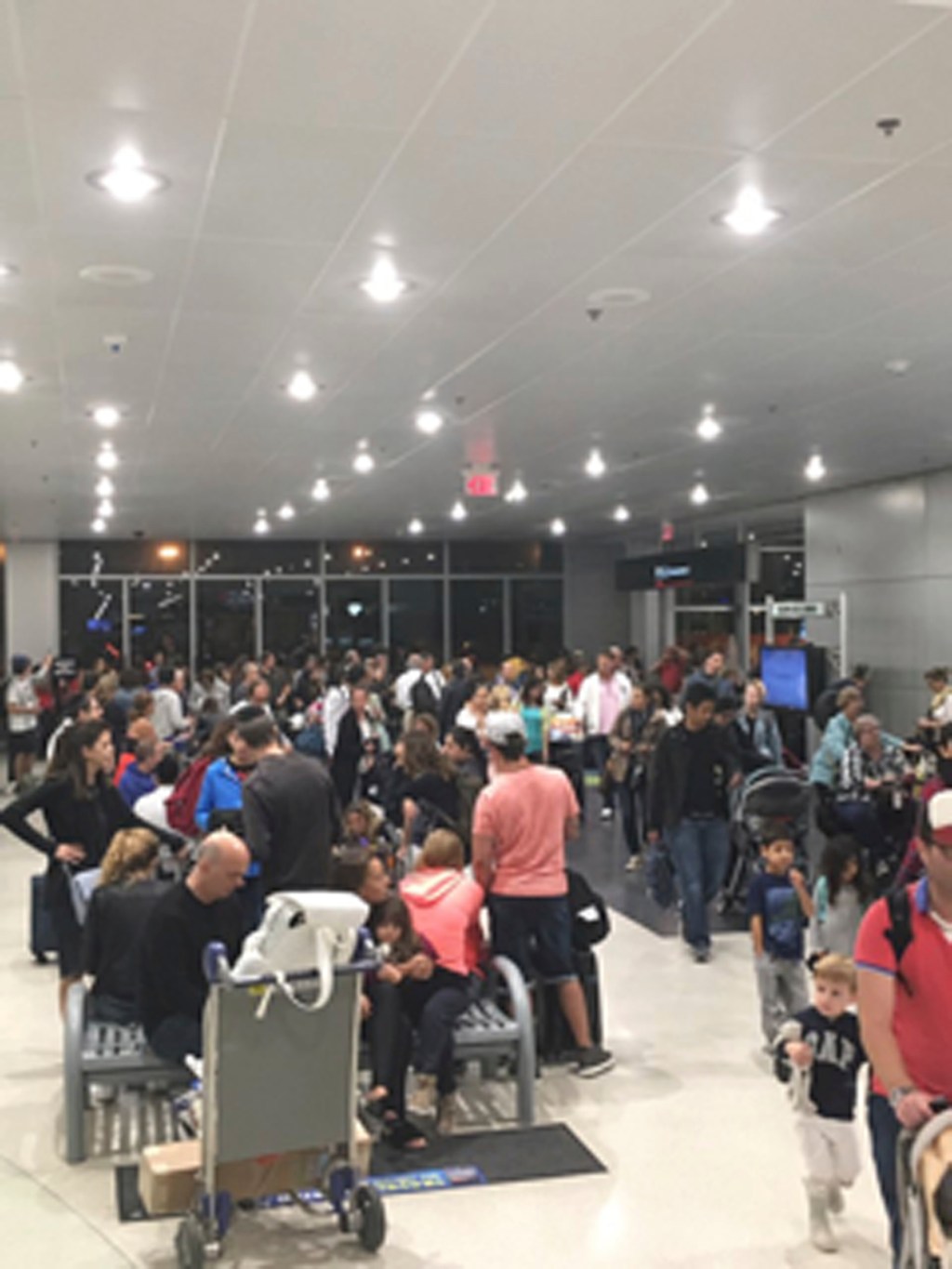 Police shoot armed man at Miami airport amid Irma&nbsp;evacuation
